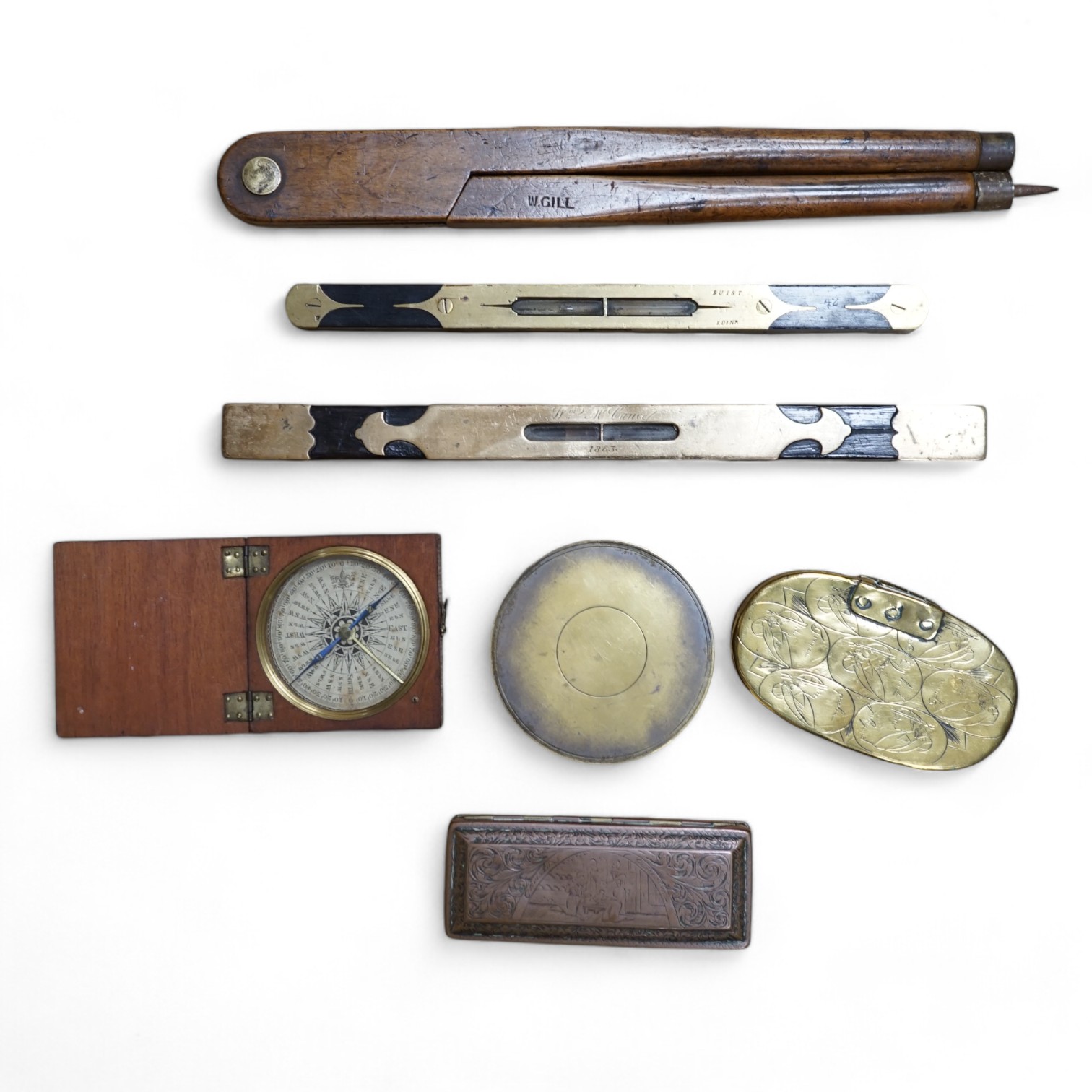 Two portable sundials, two brass inlaid spirit levels and a wood compass, wooden compass 34cm long. Condition - fair to good